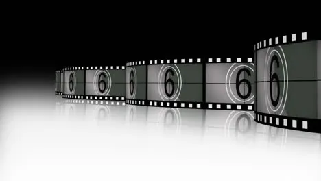 stacked film reels and a play button